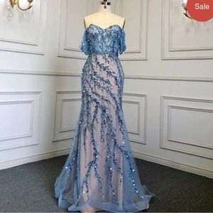 Off shoulder beaded dress